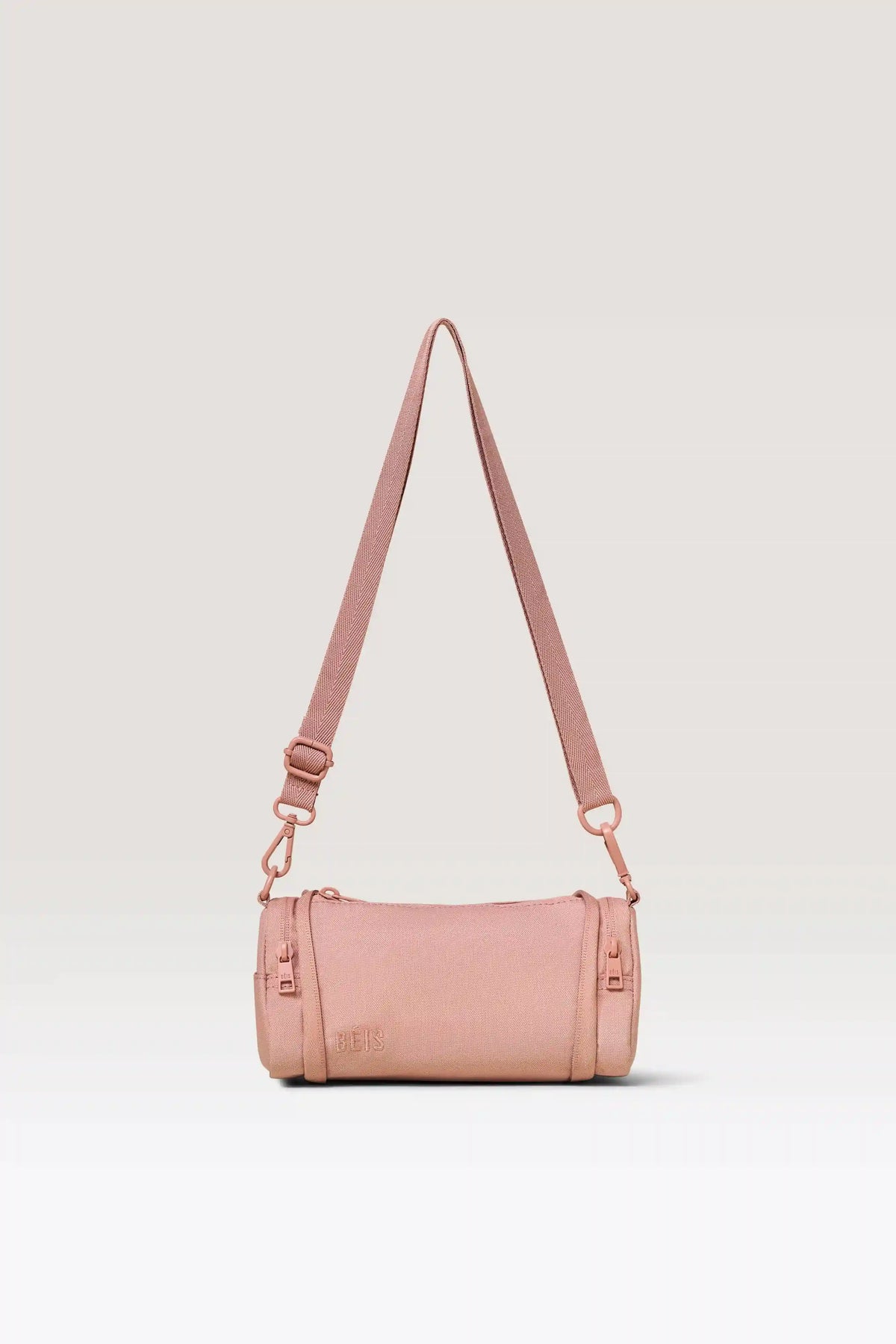 The Expandable Crossbody Charm in Atlas Pink